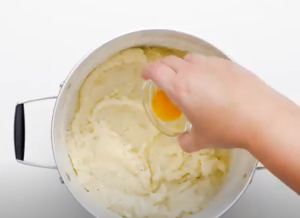 Add Salt, Pepper, Butter, and Egg Yolk