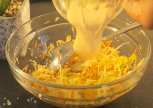Mixing All Other Ingredients into the Carrot & Cabbage