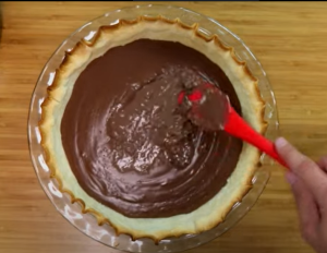  Adding Pudding Mix on the Pie Crust