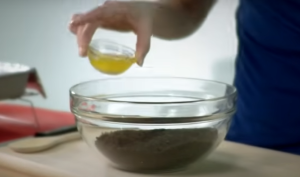 Mixing Cookies and Butter to Make Crust