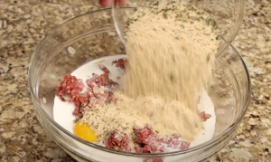 Mixing Milk, Egg, and Bread Crumbs