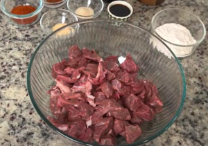 Mixing all Spices with Beef