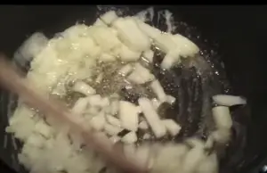 Seasoning Onion in Warm Oil