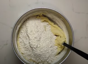 Add Dry Mixture with Butter Mixture
