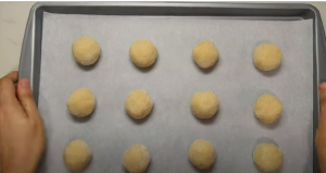 Place the Shaped Cookies on Baking Sheet to Bake