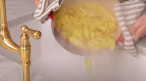Drain the Boiled Water from Potatoes 