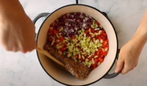 Cook Sausage, Celery, Carrot, and Bell Pepper in A Dutch for 10 Minutes